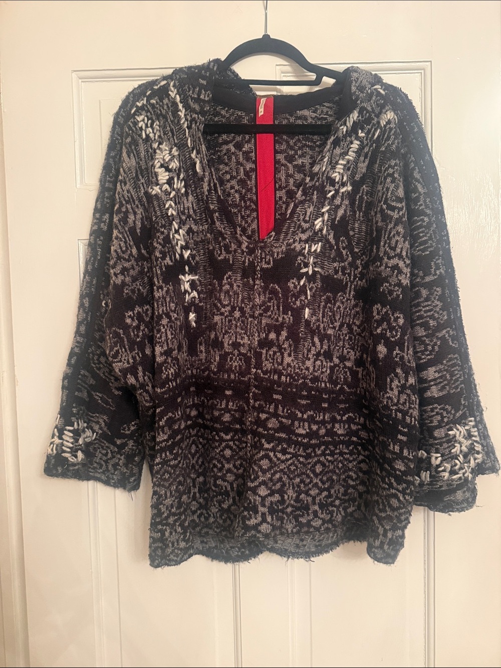 Free People Black and White Patterned V‑Neck Hoodie Sweater